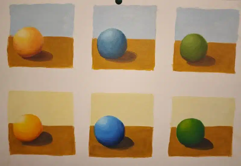 Trabajos de los alumnos Estudio de esferas con variaciones de color y fondo realizado por alumnado de ArteEscuela