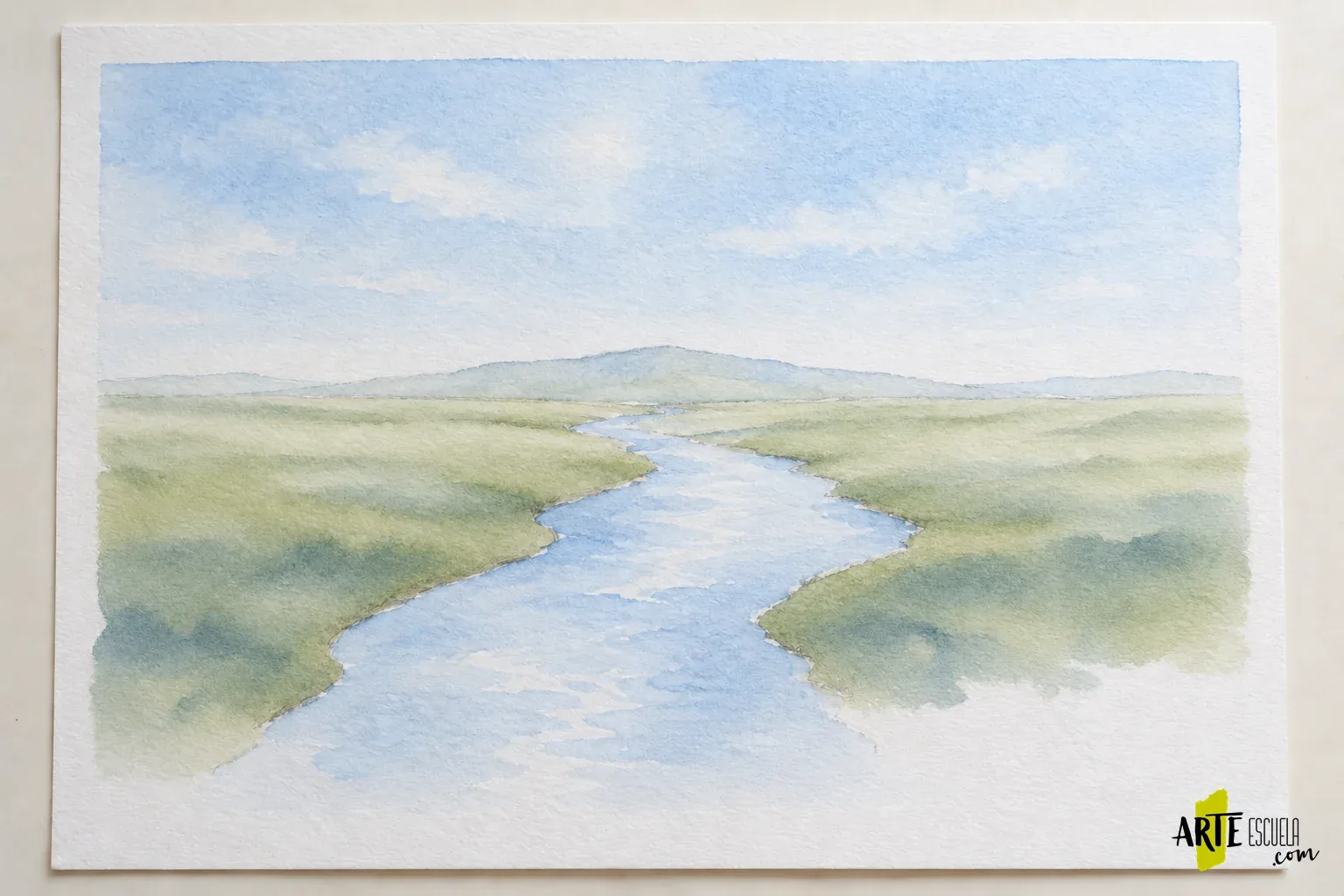 Cómo combinar acuarela y gouache sin perder las zonas transparentes Mismo paisaje de acuarela con loma y orillas verdes desarrolladas, manteniendo transparentes el cielo y el agua
